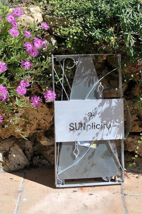 The folded SUNplicity solar cooker is very compact.