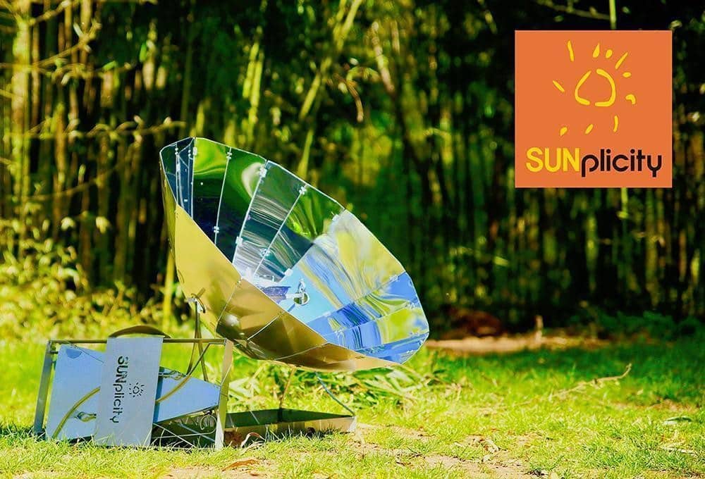 The SUNplicity foldable solar cooker in a bamboo forest